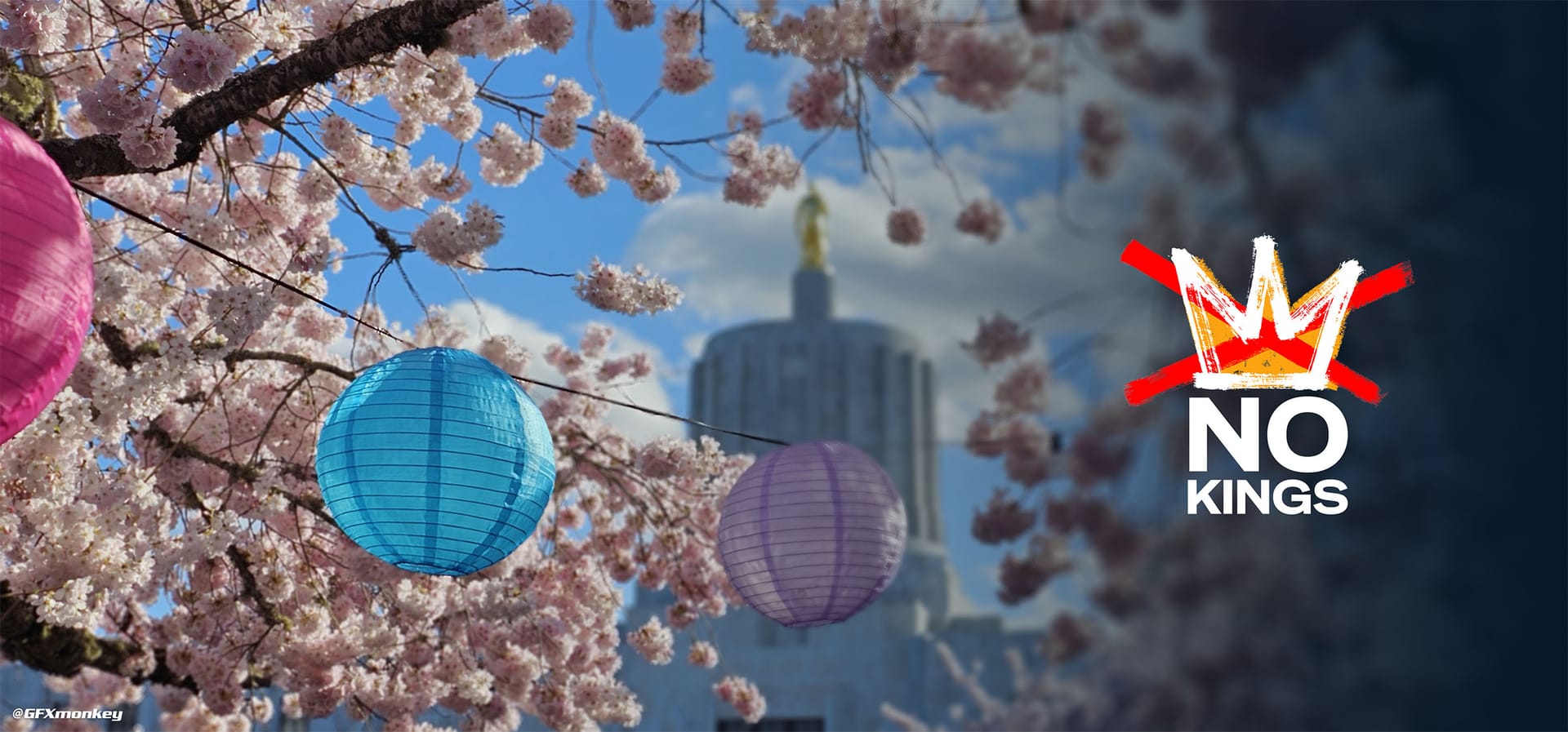 The Salem Capitol building partially obscurred by Cherry Blossoms.